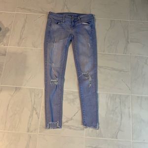 AMERICAN EAGLE size 4 skinny jeans. Frayed at bottom!